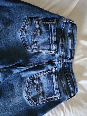 Silver Jeans Dark Blue Skinny Jeans with Distressed Back Pockets